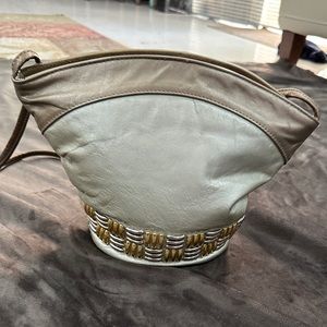 Atalla Genuine Leather metallic gold bucket Handbag vintage